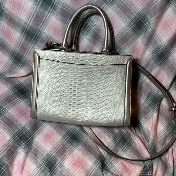 NWOT Coach Zoe Caryall in metallic snake. - Picture 2 of 14